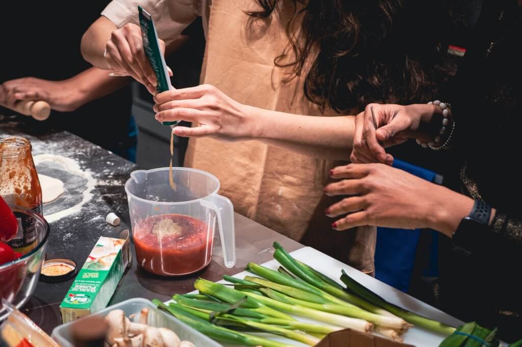 Students cooking together during Veganuary