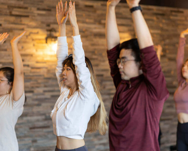 image of students taking part in a yoga class